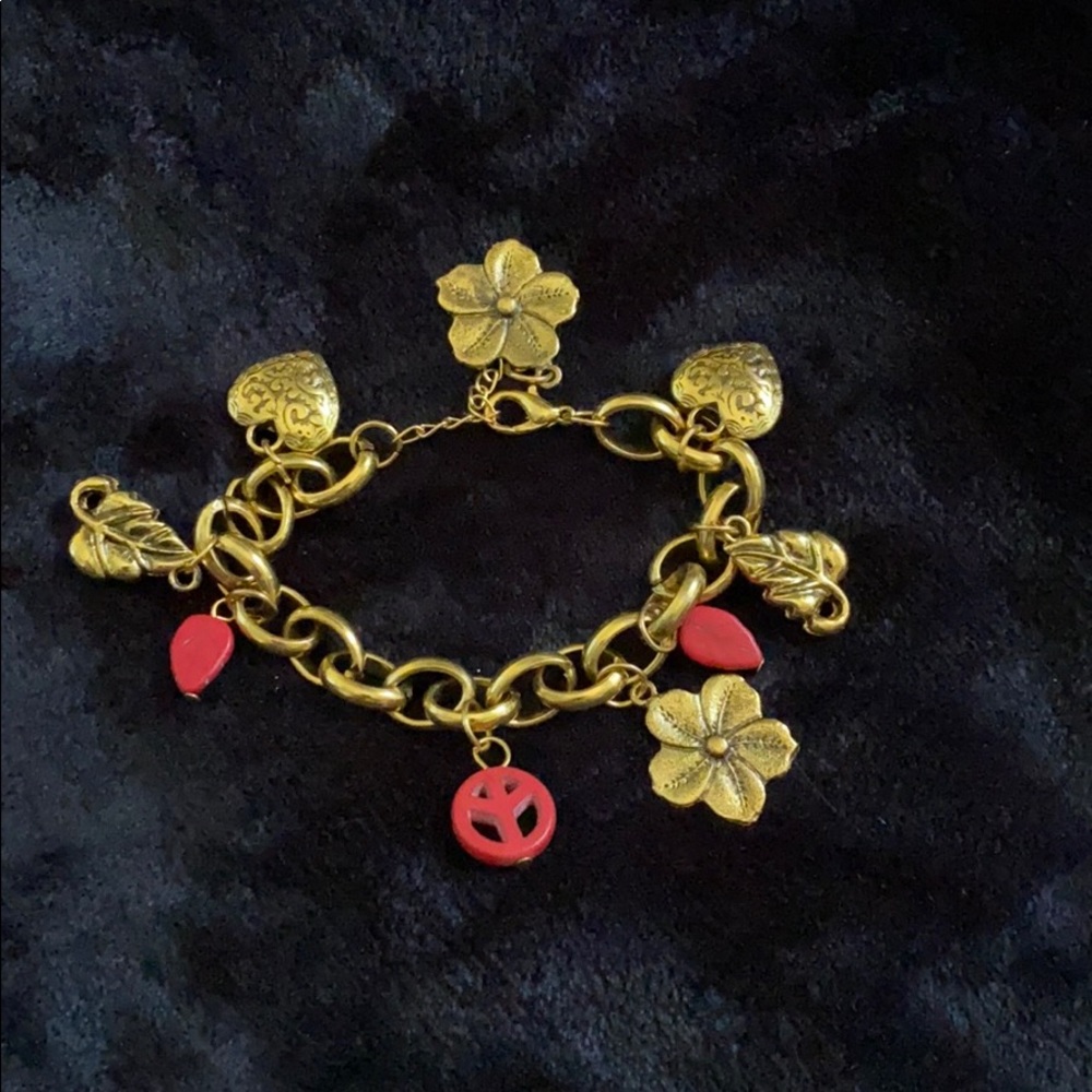 Fashion jewelry  with red & gold charms. New w tag